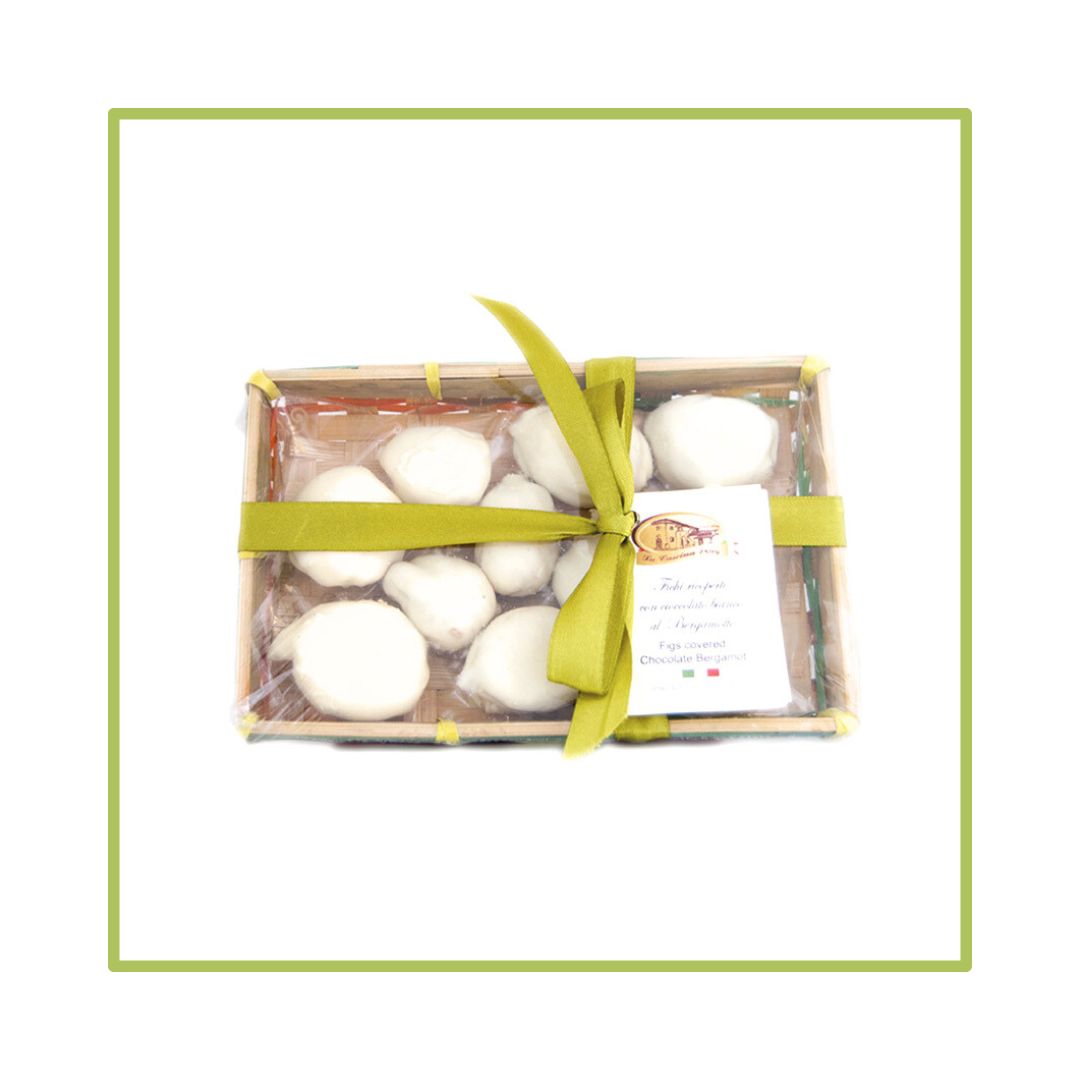 fichi secchi ricoperti di cioccolato bianco e ripieni di canditi
